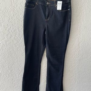 Chicos Platinum dark wash barely boot cut jeans.